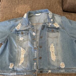 Plus size jean jacket with rips